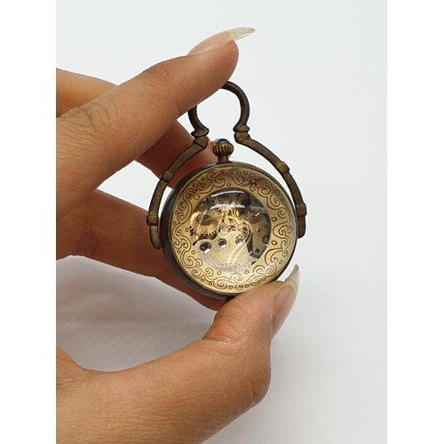 852 - Chinese vintage brass pocket ball clock exhibition back (manual wind)