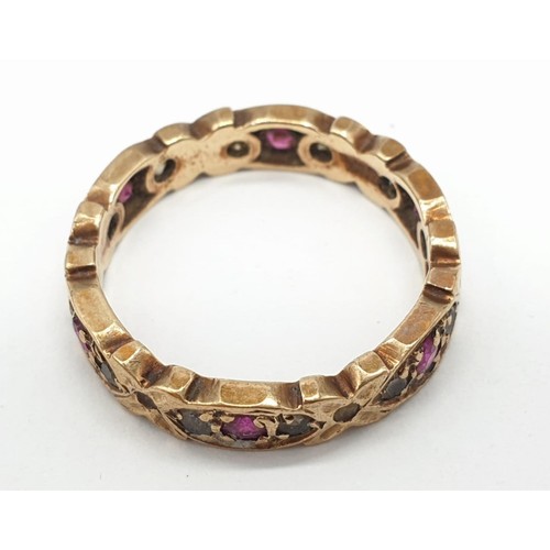 122 - Vintage 9ct gold and ruby eternity ring. Full UK hallmark. Size L to  L 1/2  Weight 2.7 grams.