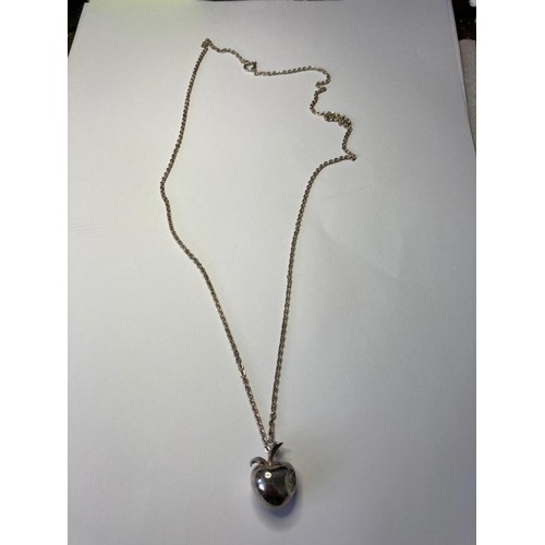 129 - Silver apple pendant mounted on extra long silver chain 925 silver. Pendant opens to reveal 'You & M... 