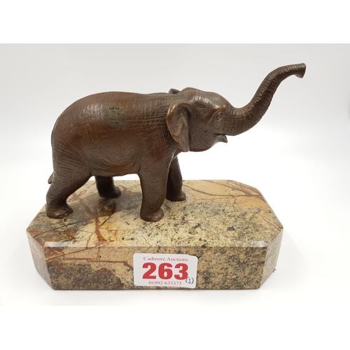 263 - 3 Vintage elephant figurines. 1 ceramic, made in France by Sevres, the other two are brass; one of w... 