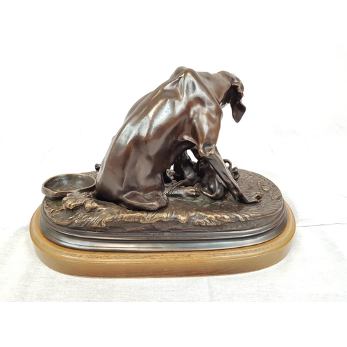 280 - A stunning bronze veritable sculpture of a dog feeding its pups. Made by the sculptor R.S Gerdon. 35... 