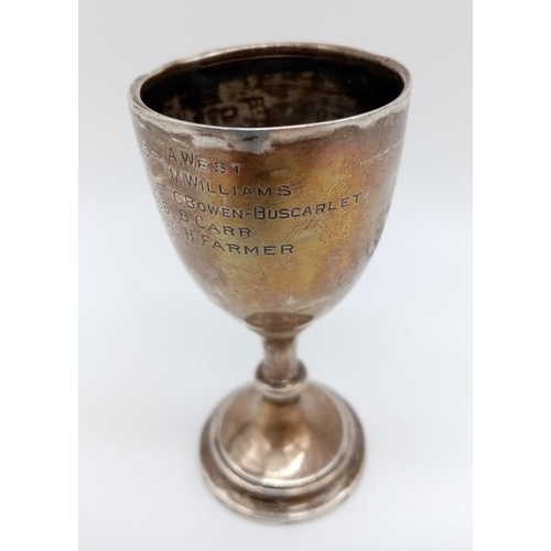 356 - A circa 1925 small silver trophy, including pedestal. 13cm in height. 27g in weight.