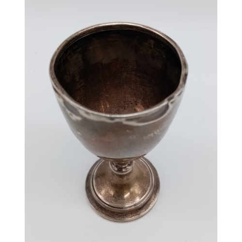 356 - A circa 1925 small silver trophy, including pedestal. 13cm in height. 27g in weight.