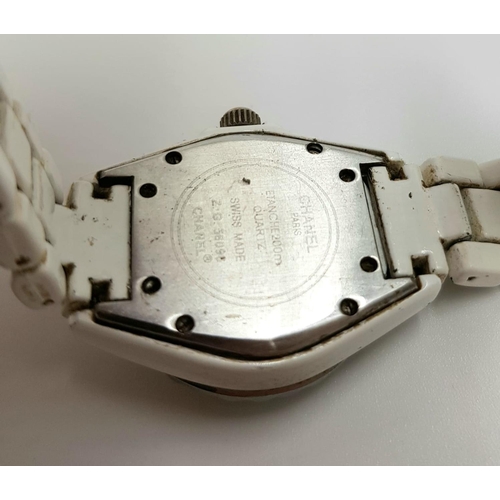 709 - A Chanel 112 styled swiss made ladies watch - white ceramic bracelet. As found.