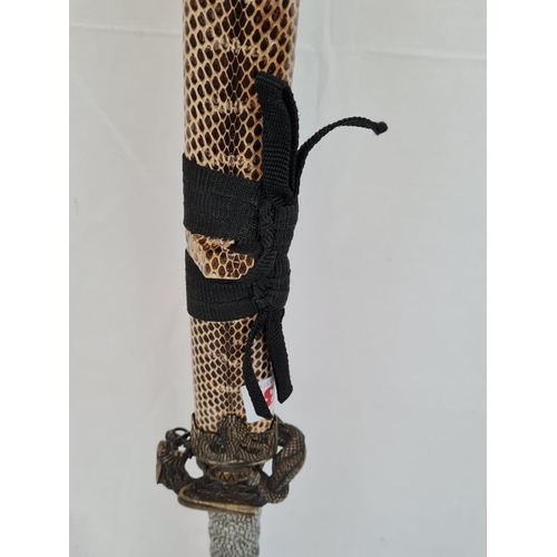 13 - Samurai style sword with cobra head handle, 108cm long approx