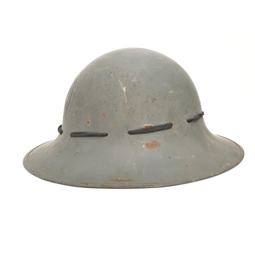 46 - WW2 Zuckerman Helmet. Marked with the Allen West Factory Logo. This company made Mills grenades duri... 