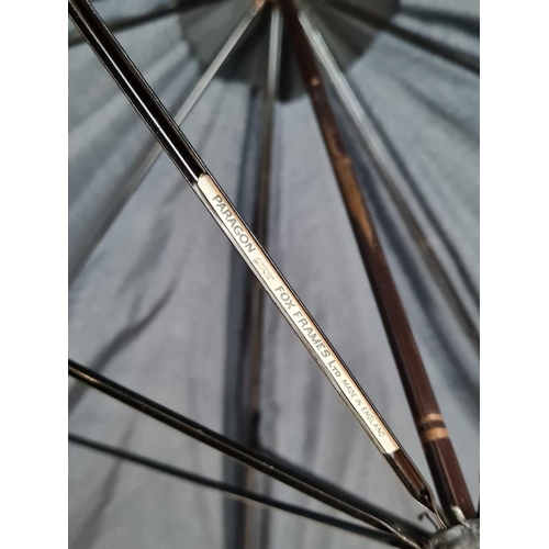 264 - A vintage 'Fox' manufactured umbrella with crocodile skin handle and 18ct gold plate trim. 86cm leng... 