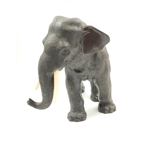 289 - A beautiful bronze elephant sculpture (circa 1930) with ivory tusks, Japanese marked, 35cm long x 26... 