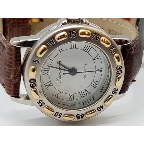 425 - 2x ladies watches, Leonardo and Gabriella Vicenga with white faces and leather straps, as new unworn