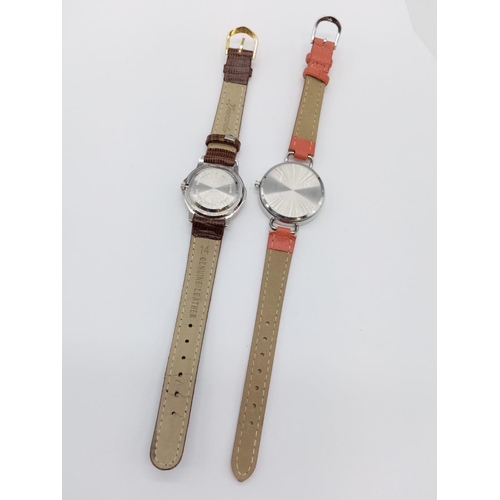 425 - 2x ladies watches, Leonardo and Gabriella Vicenga with white faces and leather straps, as new unworn