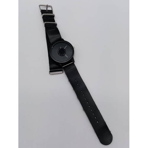 427 - Paidi men's watch, black face with simplistic dial and black strap