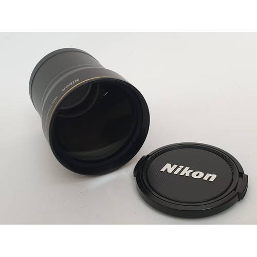 739 - A Nikon TC-E15ED telephoto converter. As new, with case and box.