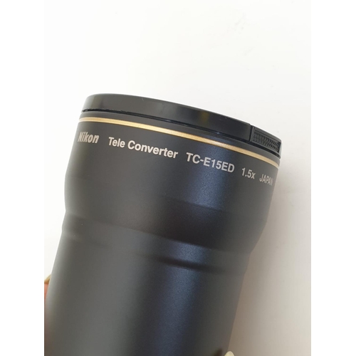 739 - A Nikon TC-E15ED telephoto converter. As new, with case and box.