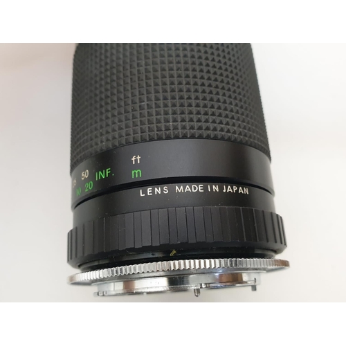 752 - A Steinheil multi coated 'one touch' zoom lens. 70mm - 140mm. Good condition.