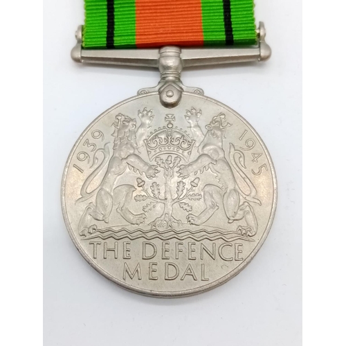 39 - WW2 British Defence Medal with a RNPS Shield (Royal Naval Patrol Service. Awarded to those who volun... 