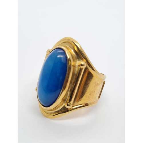 1 - 18ct yellow gold gent ring with large oval blue stone centre, weight 6.8g and size O