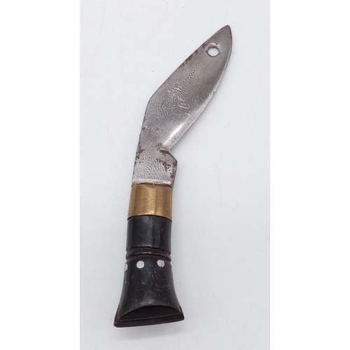 342 - A large Gurkha vintage kukri knife with patterned inscription on blade, with scabbard. 50cm long.