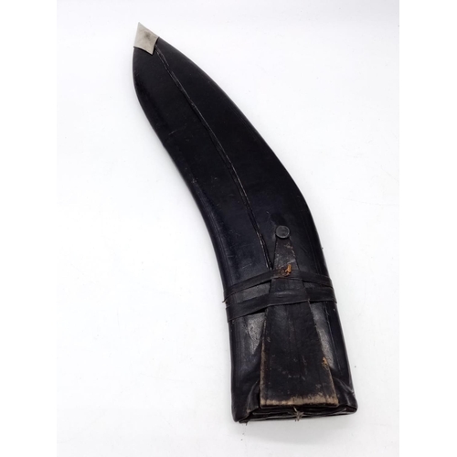 342 - A large Gurkha vintage kukri knife with patterned inscription on blade, with scabbard. 50cm long.