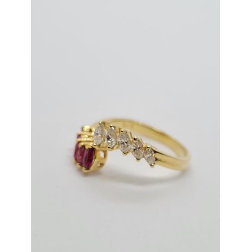 42 - 18ct yellow gold diamond and ruby ring, weight 3g and size N