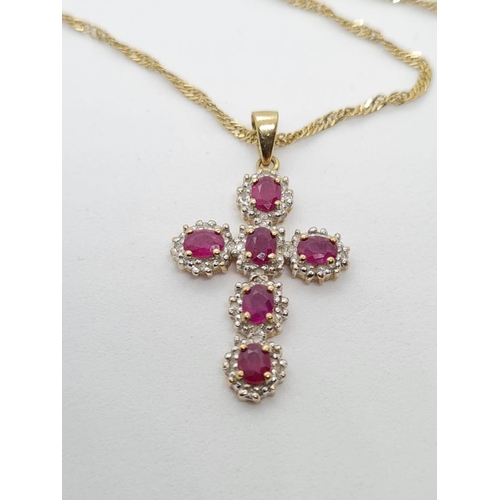 58 - 9CT DIAMOND AND RUBY CROSS PENDANT ON 44CM CHAIN , WEIGHT 3.8G