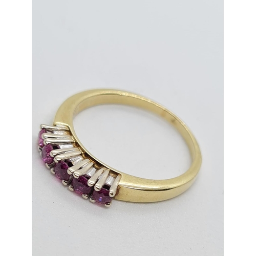 678 - 14ct yellow gold with 5 rubies. Size N. 3.3g in weight.