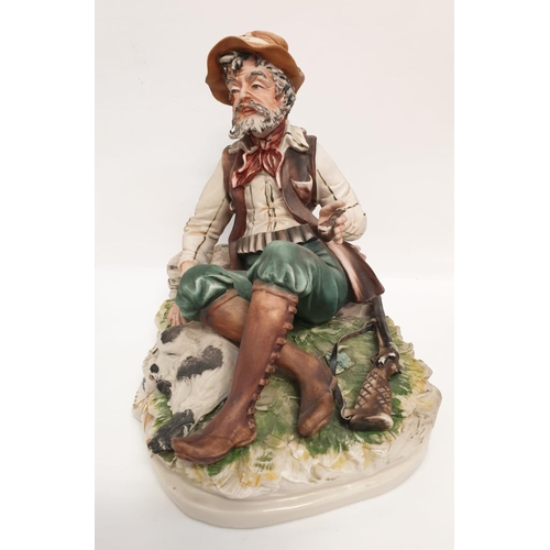 978 - A Capodimonte figure of a resting hunter. 25cm tall, 26cm diameter.