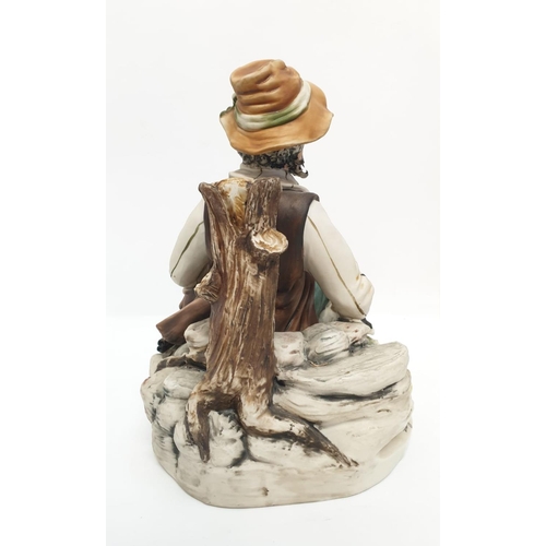 978 - A Capodimonte figure of a resting hunter. 25cm tall, 26cm diameter.