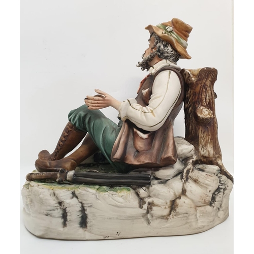 978 - A Capodimonte figure of a resting hunter. 25cm tall, 26cm diameter.