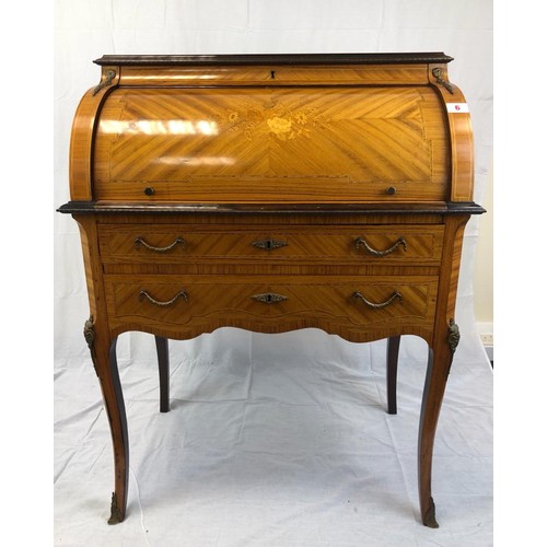 6 - A beautifully inlaid Edwardian writing bureau  with roll top and chevroned top.
104 cams tall 
76 cm... 