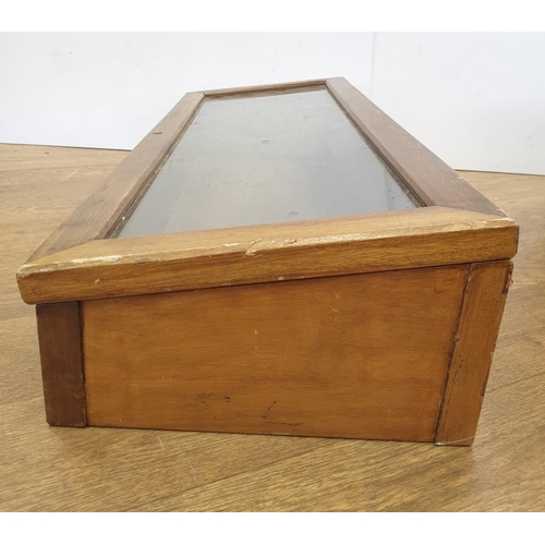 359 - A Victorian display cabinet with glass top. 90cm x 30cm.