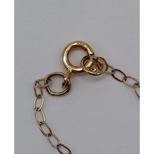 966 - Antique 9ct gold pendant on chain. 44cm in length. 1.2g in weight.