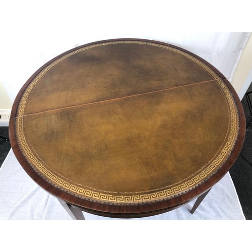 27 - A late Victorian Semi circular table that opens up into a card table with leather top, nicely inlaid... 