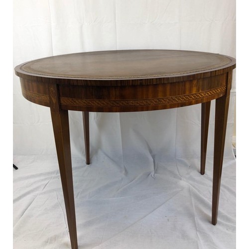 27 - A late Victorian Semi circular table that opens up into a card table with leather top, nicely inlaid... 