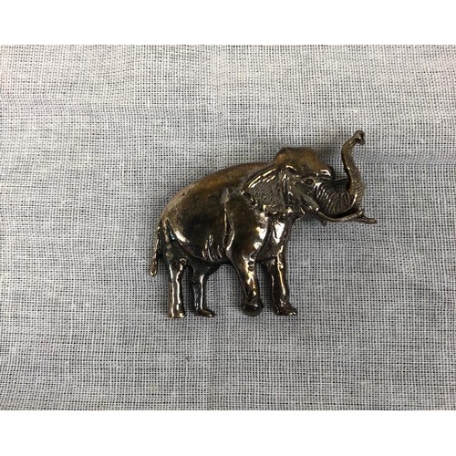 896 - 2 Elephant and 1 deer brooches in different metallic styles.