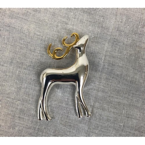 896 - 2 Elephant and 1 deer brooches in different metallic styles.