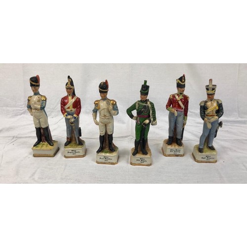 931 - Six vintage ceramic military figurines. Including an Officer of the Dragon guards and Rifle brigade.... 