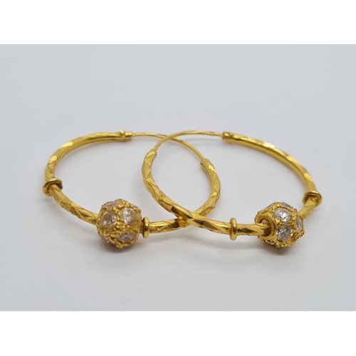 75 - Pair of 22CT yellow gold stone set hoop earrings, weight 3.4g and 25mm diameter approx