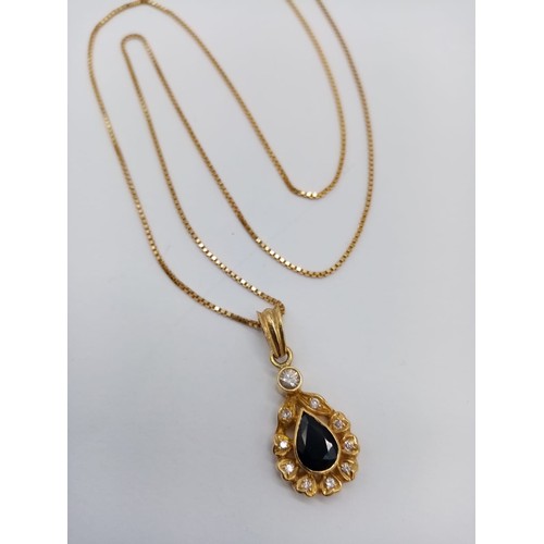 941 - Sapphire and diamond pendant set in 18ct gold on a 42cm long chain, weight 5g