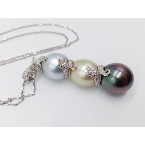 943 - South sea pearl pendant on 42cm long 18ct gold chain, weight 9.4g