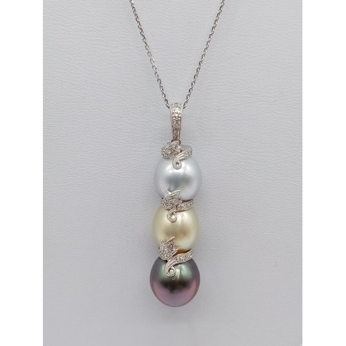 943 - South sea pearl pendant on 42cm long 18ct gold chain, weight 9.4g