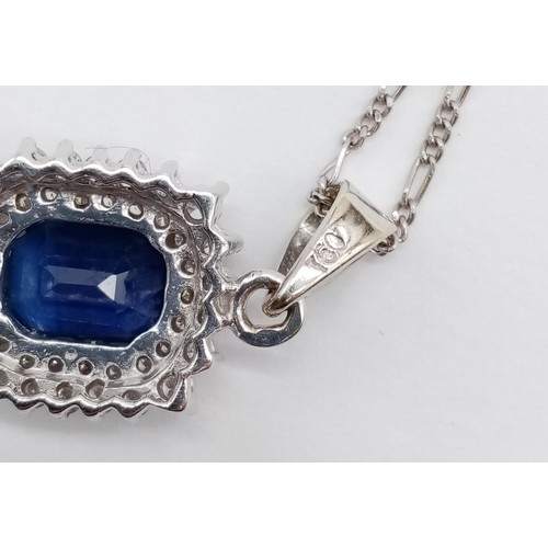 955 - Sapphire and diamond pendant on 49cm long 18ct gold chain, weight 6.5g