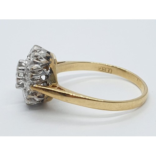 965 - 18ct gold diamond cluster ring. Size L. 3.1g in weight.