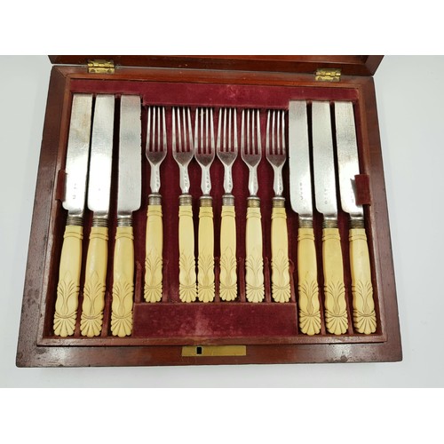 908 - An antique set of 24 knives and forks, most possibly by William Savage & Co of Sheffield, silver pla... 