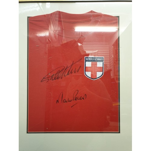 932 - An iconic, 1966 styled framed England shirt signed by hat-trick hero Sir Geoff Hurst and Martin Pete... 