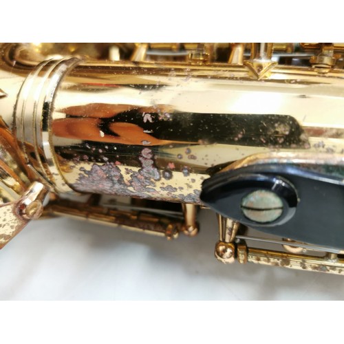 362 - A brass saxophone - the signature series. Original case in good working condition but needs cosmetic... 