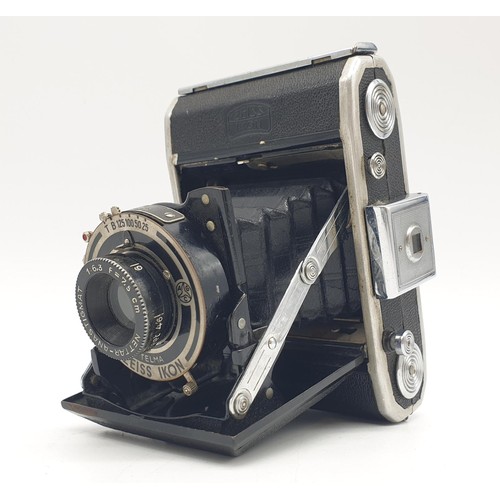 771 - A vintage Zeiss Ikon Telma folding camera. As found.