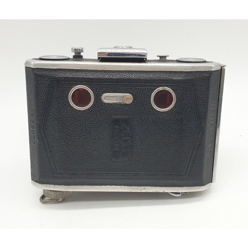 771 - A vintage Zeiss Ikon Telma folding camera. As found.