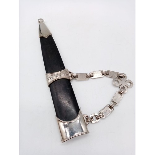 316 - An interesting reproduction Nazi dagger with chain attached to its scabbard. German inscription on b... 