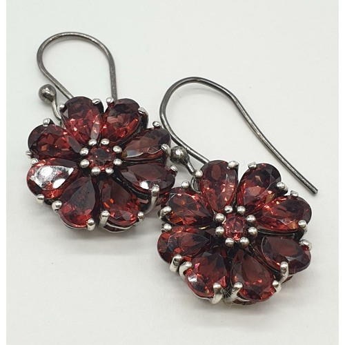 303 - silver stone set earrings floral design, weight 4.6g