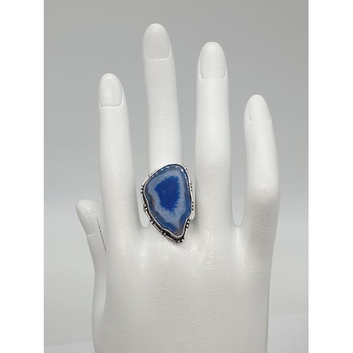 92 - A necklace, bracelet and ring set with blue agate from Botswana, in a presentation case. Necklace le... 